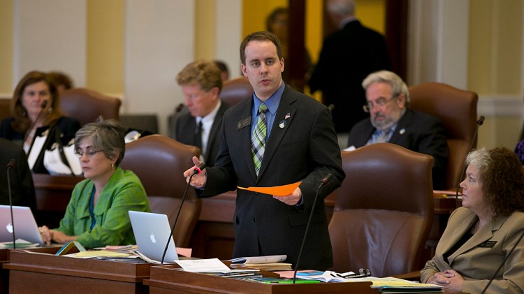 State Sen. Eric Brakey of Auburn speaks in Augusta in 2015. 