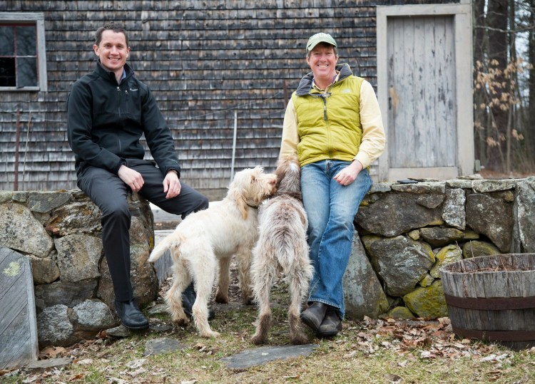Conservation Law Foundation attorney Phelps Turner, left, and Executive Vice President Sean Mahoney, pictured at Mahoney's Falmouth home with his dogs Lola and Fergus. The Legal Food Hub, winner of a 2019 Source Award, is a program of the Conservation Law Foundation. 