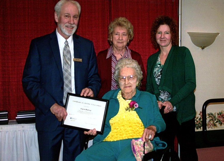 Richard Erb of the Maine Healthcare Association, left, with Gayla Garland, daughter of Joyce Bishop;
Joyce Bishop, resident of Cedar Ridge Center in Skowhegan; and Karen Doiron, nurses aide at Cedar Ridge Center.