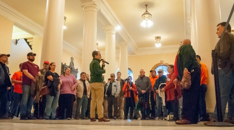 Eric Brakey speaks at a rally in support of gun rights Friday before a day of testimony on gun bills before the Criminal Justice and Public Safety Committee.