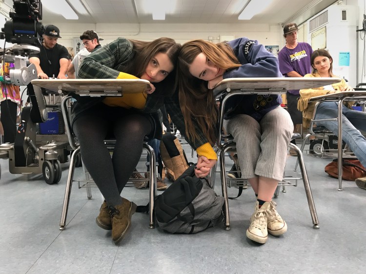 Actors Beanie Feldstein and Kaitlyn Dever on the set of Olivia Wilde’s directorial debut, "Booksmart."