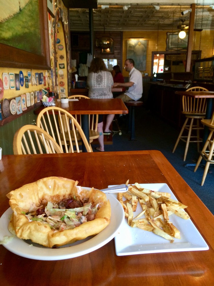 Darby's fiesta salad and hand-cut French fries satisfy even the hungriest cyclist's appetite - so much so the writer, having just finished a grueling ride, forgot to photograph the food when it first arrived. Staff photo by Deirdre Fleming