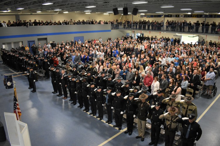 An overview of the Maine Criminal Justice Academy graduation of 63 new police officers. The event was held May 24 in the academy's Tactical Center in Vassalboro.