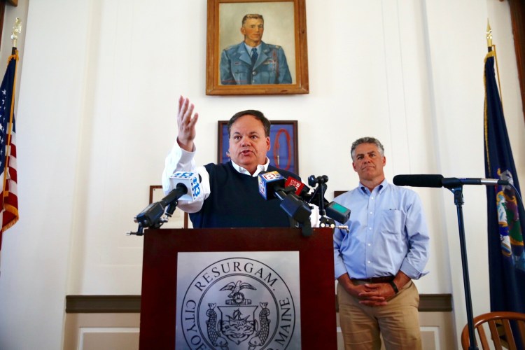 Portland City Manager Jon Jennings speaks at a news conference in June at City Hall, with Mayor Ethan Strimling behind him. The author argues that Portland's system of government allows a city manager to dominate city government.