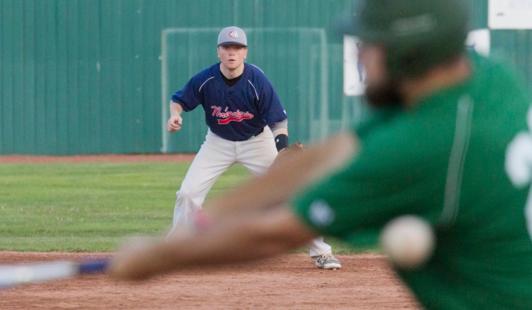 Max Salevsky, manning first base for the Nor'easters, watches as a Norsemen opponent takes a cut at the plate.