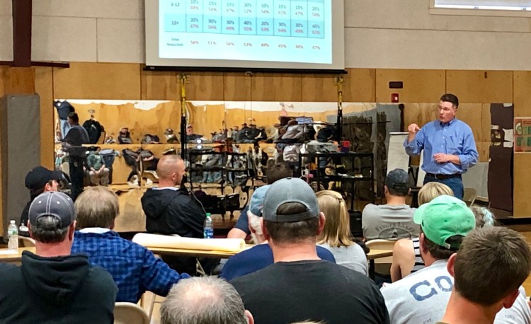 Marine Resources Commissioner Patrick Keliher addresses lobstermen at Tuesday's meeting in Trenton. Seated near him is the Zone B lobster zone council.