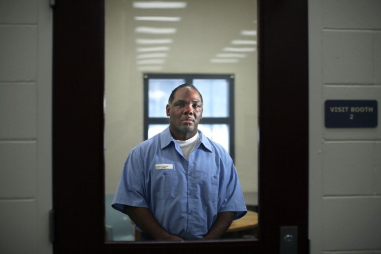 Foster Bates is shown earlier this year in a visiting room at the Maine State Prison in Warren. Bates has been serving a life sentence since he was convicted in 2002 of raping and murdering a South Portland woman. He has maintained his innocence from the start and pushed for a new trial.