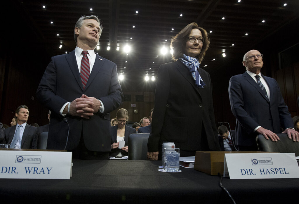 From left, FBI Director Christopher Wray, CIA Director Gina Haspel and Director of National Intelligence Daniel Coats arrive to testify before the Senate Intelligence Committee on Capitol Hill in Washington Tuesday, Jan. 29, 2019. (AP Photo/Jose Luis Magana)