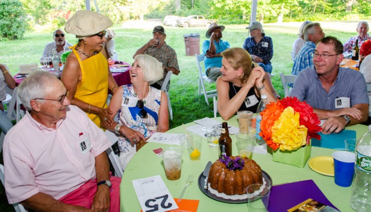 Guests at Lincoln County Historical Association’s annual Kermess celebrate their winning bid for a cake. The event raises funds to support the mission of the organization to maintain three house museums and to preserve and interpret the history of Lincoln County, Maine. Photo by Bob Bond. Those at the table, from left are, Ted Frois, Claudia Sortwell, Louana Frois, Alice Knapp and Jamie Stark.