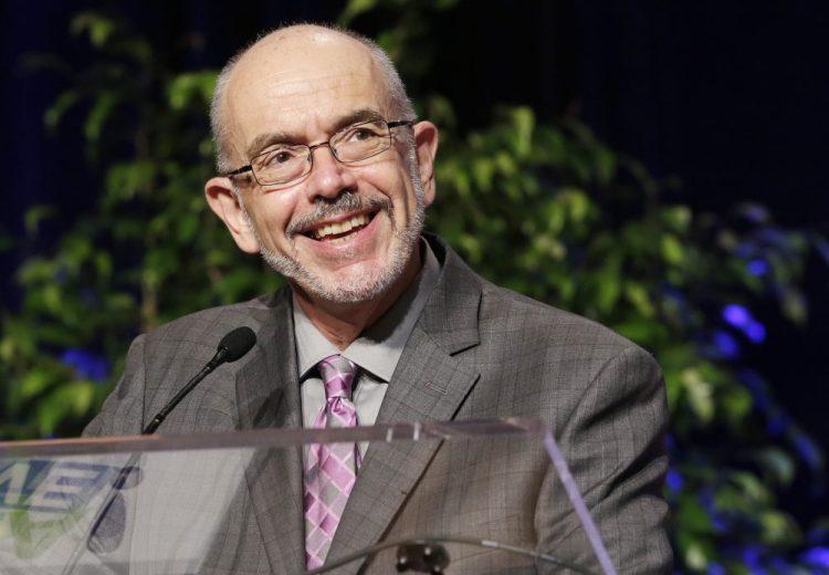 In this May 30, 2013 file photo, author Wally Lamb speaks at Book Expo America in New York.  