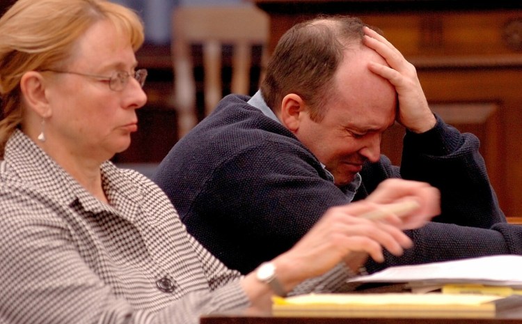 Todd Curry breaks down after a brief testimony during a hearing inside the Somerset County Superior Court in Skowhegan on Oct. 21, 2015. Curry was found not criminially responsible in the death of Anthony Tucker in 2006. Seated beside Curry is his attorney Janet Mills.