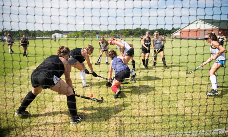 The Skowhegan field hockey team works through a drill during an Aug. 22 practice in Skowhegan.