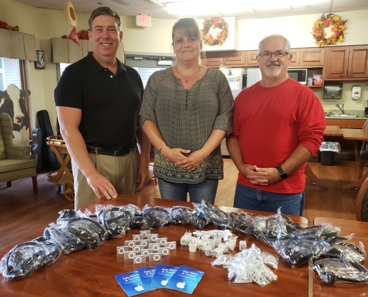 Rebecca Jipson, a student at Kennebec Valley Community College in Fairfield, recently raised funds to buy equipment for sensory stimulation activities for residents with Dementia at Cedar Ridge Center in Skowhegan. The project was through her sociology class at KVCC. From left are Jamie Doiron, recreation director at Cedar Ridge Center; Jipson; and KVCC Professor Mark Kavanaugh.