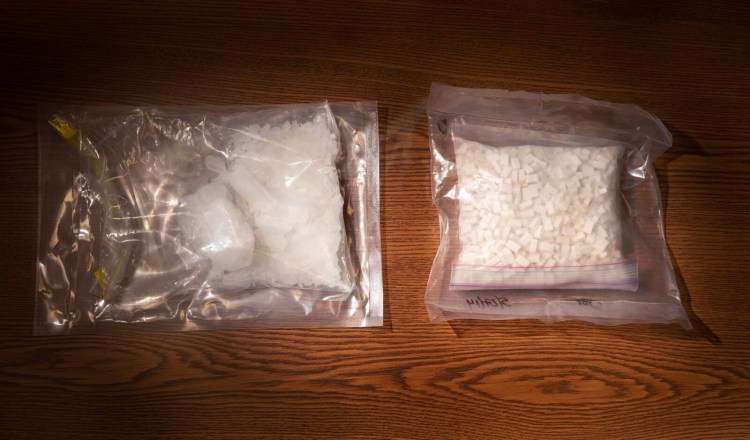 Two types of methamphetamine have found their way into Maine: on the left, a high purity crystalline form and, on the right, a pill form, photographed Friday at the Maine Drug Enforcement Agency in Portland.