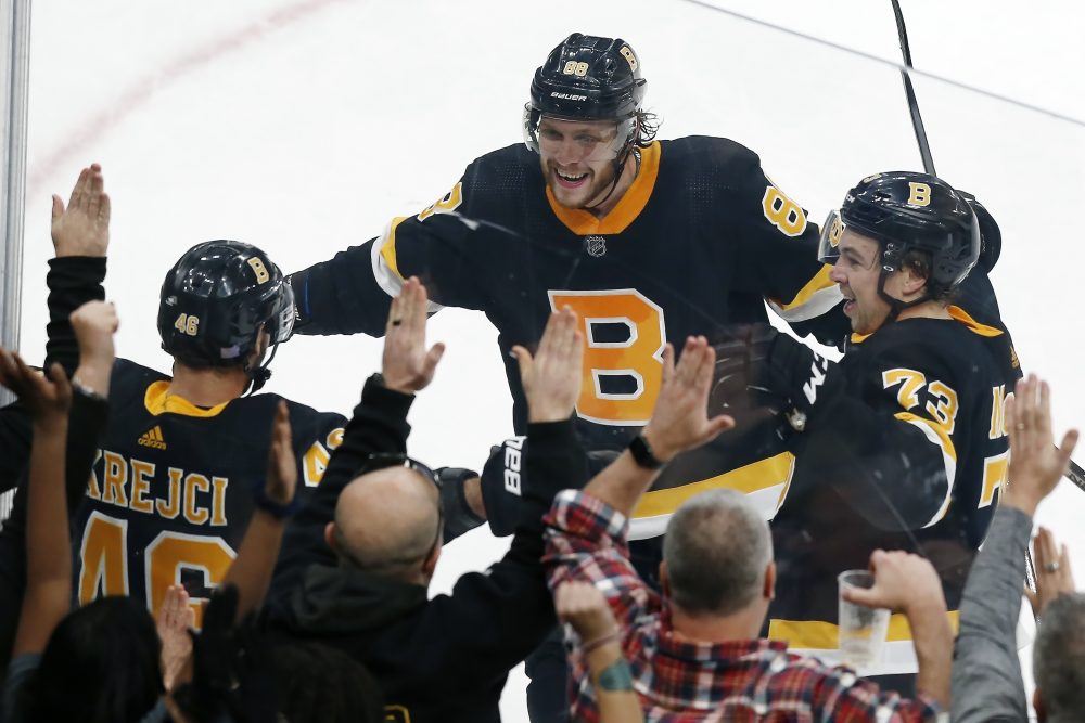 David Krejci, David Pastrnak, Charlie McAvoy