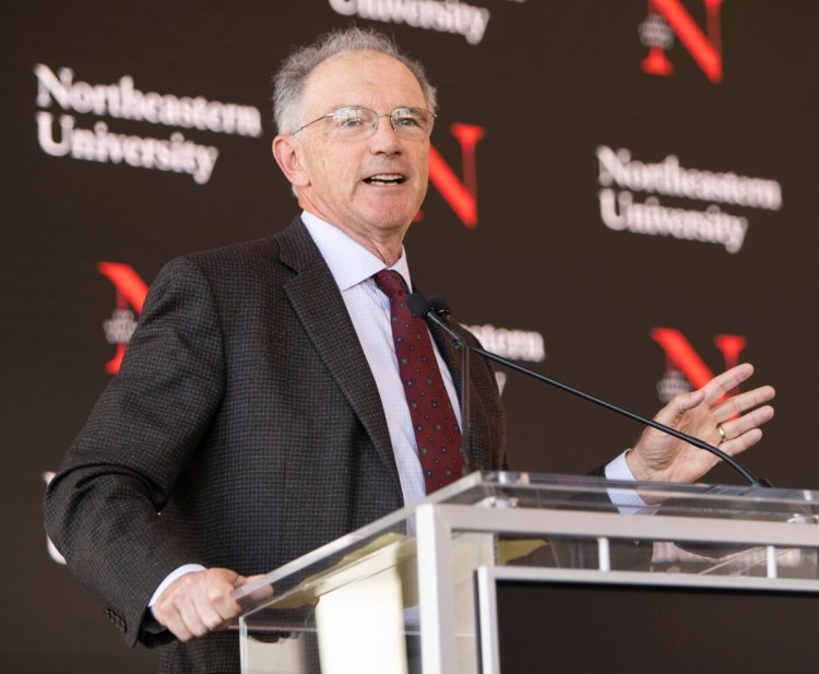 Lewiston tech entrepreneur David Roux  speaks about Northeastern University's future technology education center in Portland, which Roux is funding, during a news conference at the Portland Ocean Gateway on Monday.