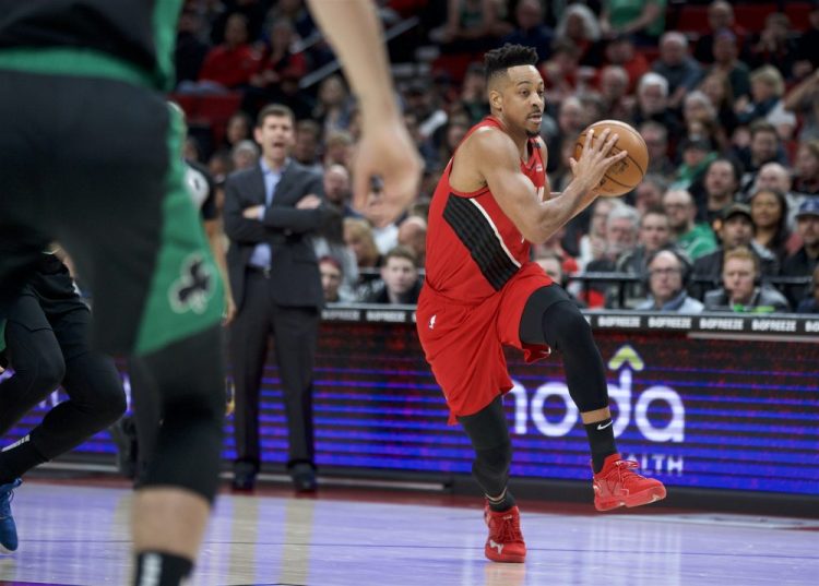 Trail Blazer guard CJ McCollum drives to the basket against the Celtics in the first half of Tuesday night's game in Portland, Ore.