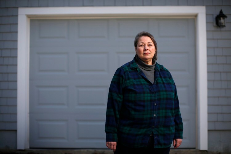 Colleen Graves, 61, of Cape Elizabeth, photographed at her home Wednesday, worked as photographer in Portland hospitals, taking baby pictures on commission. She was laid off along with other non-essential employees as the hospitals geared up for COVID-19 patients. Filing for her first-ever unemployment claim ever was jarring.