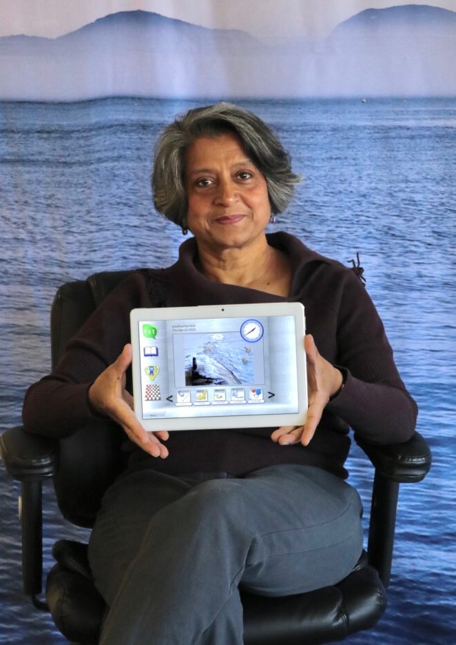 Piali De, CEO of Senscio Systems, holds the company's Ibis tablet. The Scarborough-based company is expanding to offer its home-based health management system to more patients.