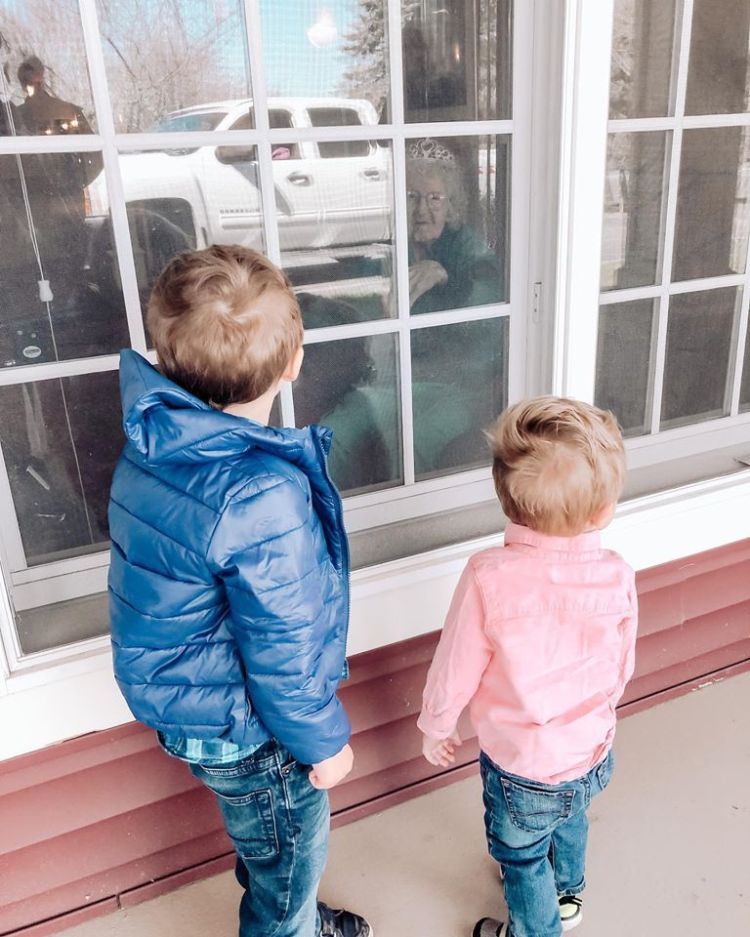 CJ Nalepa, 4, and Landon Nalepa, 1, children of Chris and Erin Nalepa, of Oakland, saying hi to Great Grammie Good at Woodlands Senior Living in Waterville.