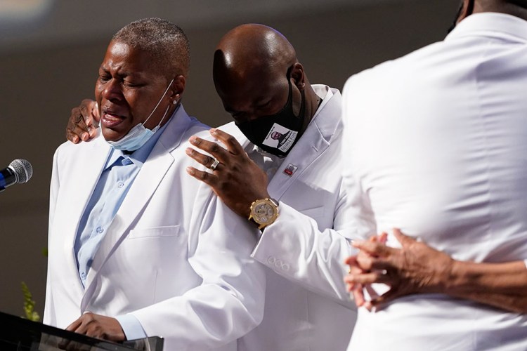 LaTonya Floyd speaks emotionally during the funeral for her brother George Floyd on Tuesday at The Fountain of Praise church in Houston.