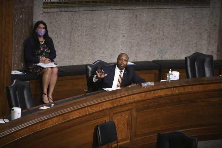 Sen. Timothy Eugene Scott, R-S.C., speaks during a committee hearing Tuesday. He said, “I think we should all be optimistic" about the prospects for reform. "We have no reason not to be.”