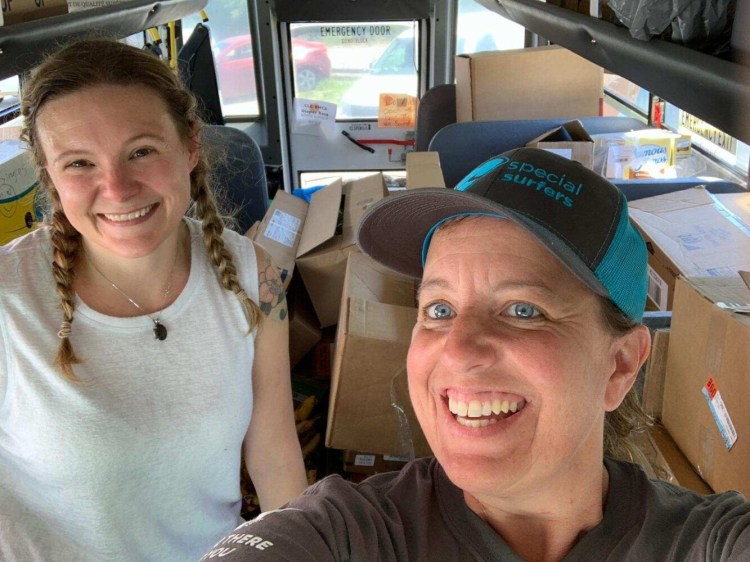 LCFI Project Coordinator Jess Breithaupt, left, and Navigator Karen-Ann Hagar on a supply run for the Lincoln County Food Initiative.