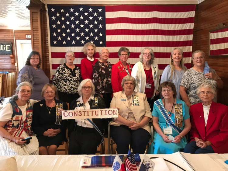 Front from left are Bonnie Wilder, Mary Ann Magnuson, State Regent Beverly Robbins, Natalie Weise, Ann Thomas and Virginia Hersom. Back from left are Jennifer Philips, D. Johan Brown, Cheryl Beyeler, Linda Cobb, Penny Pray, Elizabeth Cousins, Carolyn Van Horn and Margaret LaVallee.