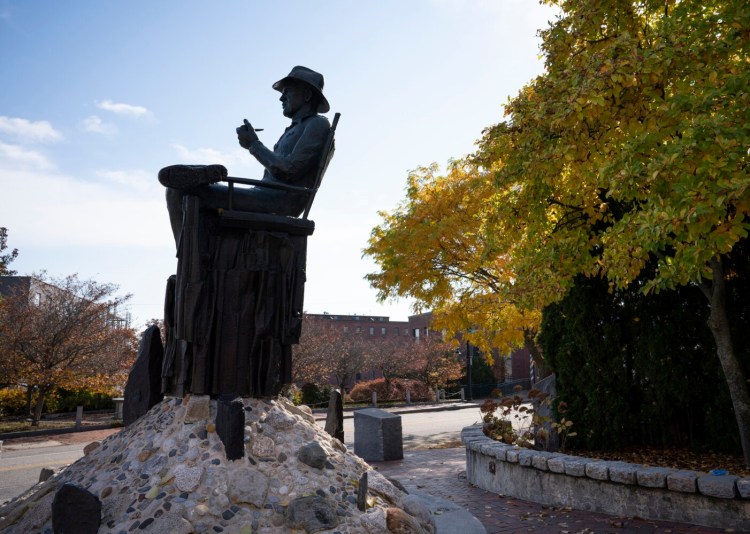 The John Ford statue at the corner of Pleasant, Center and York streets in Portland's Old Port. 