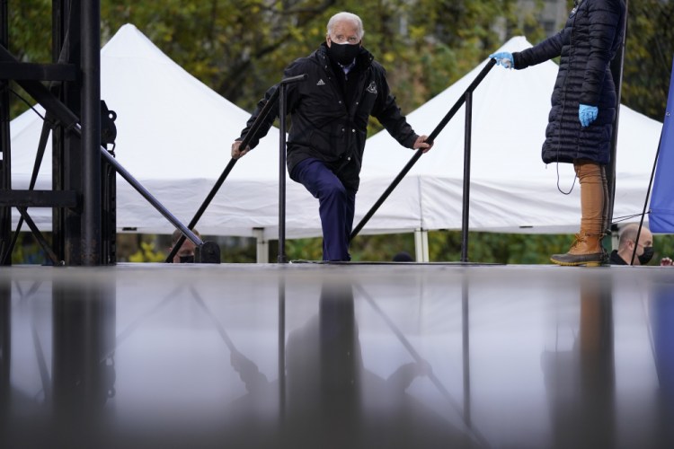 Democratic presidential candidate former Vice President Joe Biden arrives to speak at a "Souls to the Polls" drive-in rally at Sharon Baptist Church on Sunday in Philadelphia.