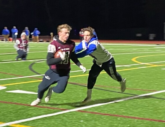 Mt. Ararat's Nolan Blessington, right, tags Freeport's Justin Cogswell during a 7-on-7 football game earlier this season in Freeport.