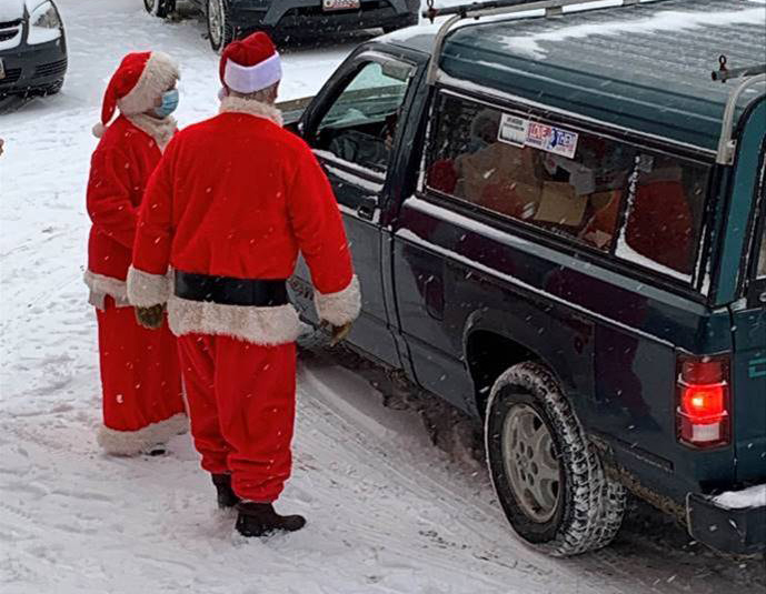 “Tom Ross was Santa and Mrs. Claus, Shirley Melancon, was Santa, Tom Ross, deliver meals Dec. 22 during the weekly drive-thru meals program at St. Anthony's Soup Kitchen in Skowhegan.