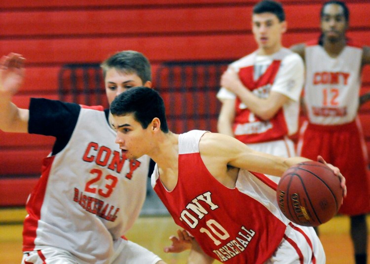 AUGUSTA, ME - DECEMBER 17: Cony High School's Liam Stokes dribbles Wednesday December 17, 2014 during practice in Augusta. (Kennebec Journal photo by Andy Molloy/Staff Photographer)