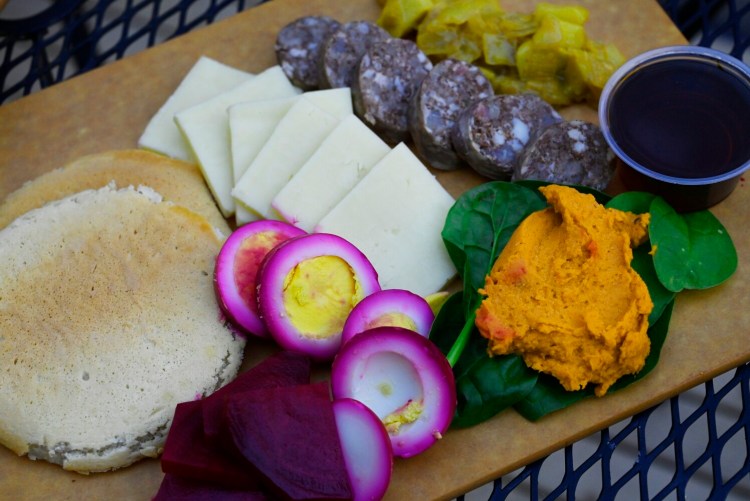 PORTLAND, ME - JANUARY 8: A breakfast charcuterie board at The Thirsty Pig Friday, Jan. 8, 2021. The board includes pancakes, pickled eggs, cheese, spinach and hummus, sausage, apple chutney and Maine maple syrup. (Staff Photo by Shawn Patrick Ouellette/Staff Photographer)