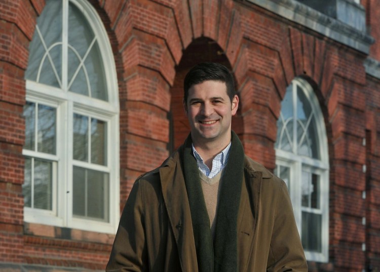 Nick Isgro served as the mayor of Waterville for six years, He is shown outside Waterville City Hall on Tuesday. 