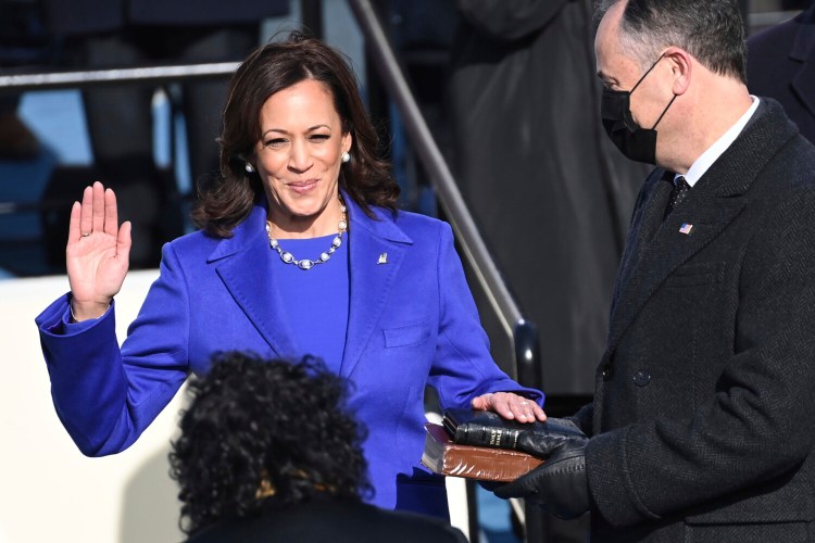 Kamala Harris is sworn in as vice president by Supreme Court Justice Sonia Sotomayor as her husband Doug Emhoff holds the Bible during the 59th Presidential Inauguration at the U.S. Capitol in Washington, Wednesday, Jan. 20, 2021.(Saul Loeb/Pool Photo via AP)