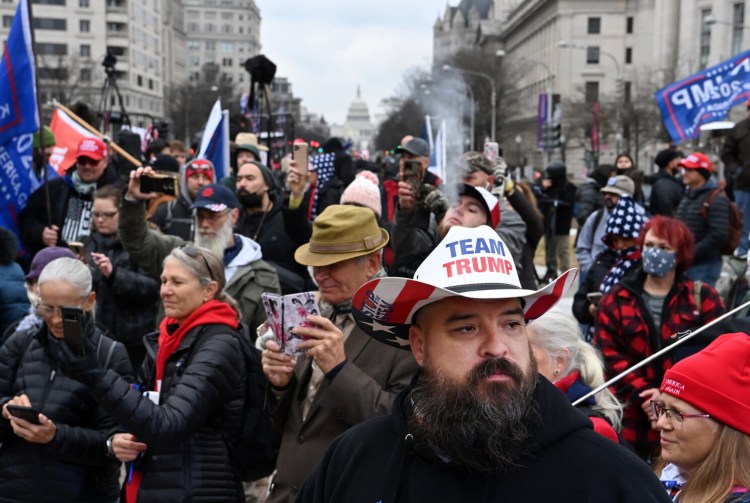 Supporters of President Trump gather at Freedom Plaza on Tuesday. 