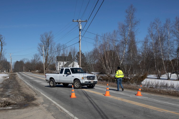 BUXTON, ME - MARCH 4: An emergency vehicle blocks off Long Plains Road on Thursday, March 4, 2021. Buxton police have closed a section of Long Plains Road as they deal with a public safety incident Thursday morning. Police have not released any details about what is going on, but have closed Long Plains Road between Parker Farms and Limington roads. (Staff photo by Brianna Soukup/Staff Photographer)