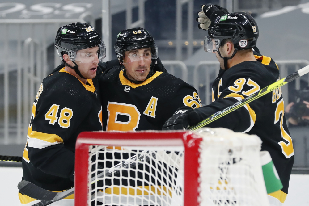 Brad Marchand, Patrice Bergeron, Matt Grzelcyk