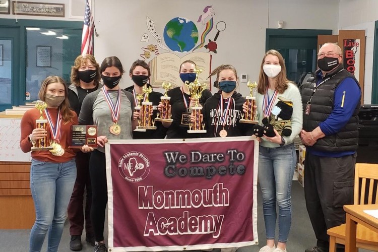 Monmouth Academy Academic Decathlon 2021 team with coaches, from left, are 
Rhayna Poulin, Coach Cathy Foyt, June Foyt, Ostin Hasenfus-Smith, Delaney Houston, Olivia Degen, Holly Hunt and Coach Scott Foyt.