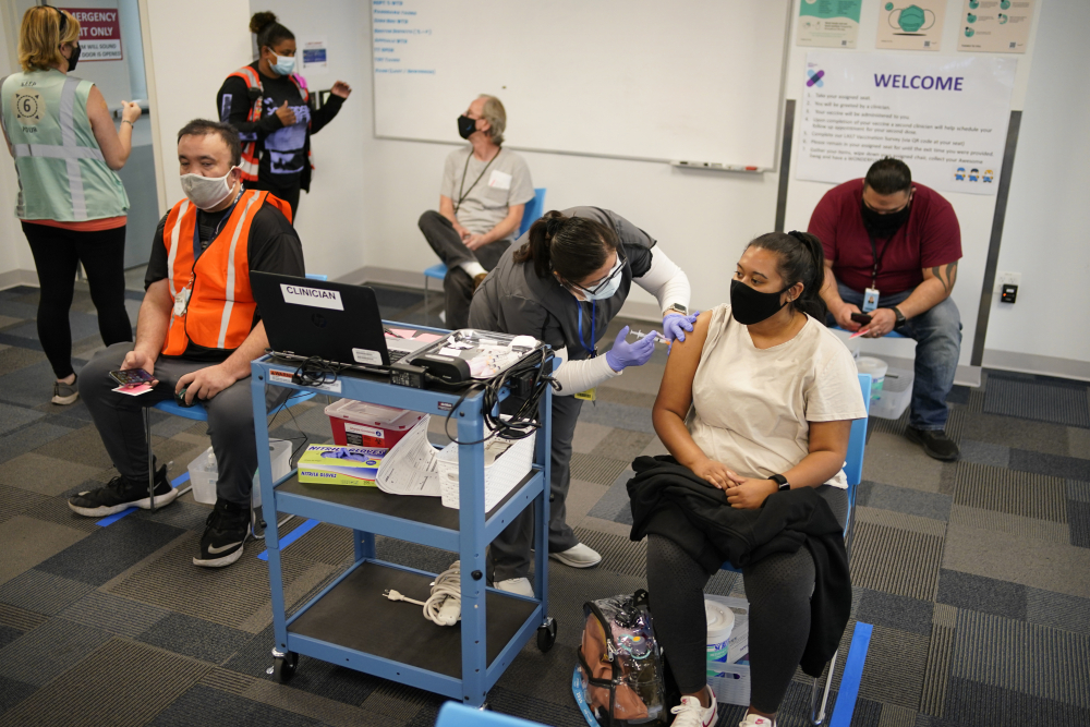 Virus_Outbreak_Workplace_Vaccines_85123
