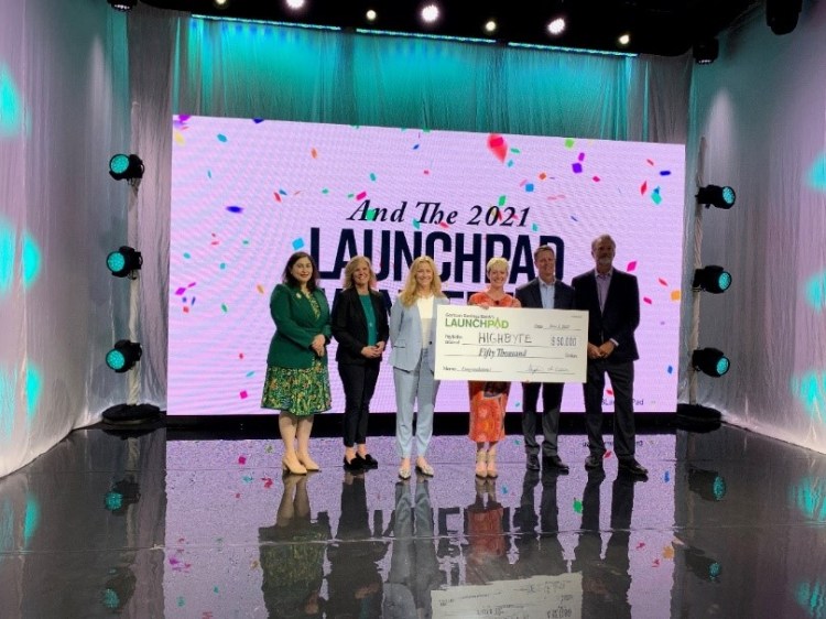 (From left) Contest judge Kate McAleer, emcee Michelle Neujahr, judge Catherine Cloudman, 2021 LaunchPad Winner Torey Penrod-Cambra of HighByte, president and CEO of Gorham Savings Bank Steve deCastro, and judge Ed McKersie.