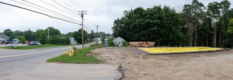 Several buildings and greenhouses at Roak the Florist on outer Main Street in Lewiston have been torn down and the foundation has been poured for a new building that will be shared between the florist and Urban Garden Center.