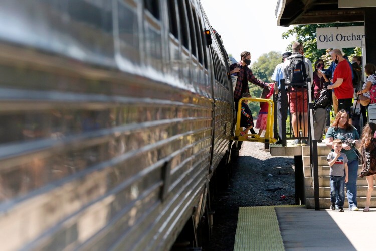 Passengers disembark from the Amtrak Downeaster at Old Orchard Beach on Saturday morning. Transit agencies are slowly recovering after the bruising they took during the pandemic, but some think the only way to restore ridership and revenue is to innovate and expand the regional transit network.