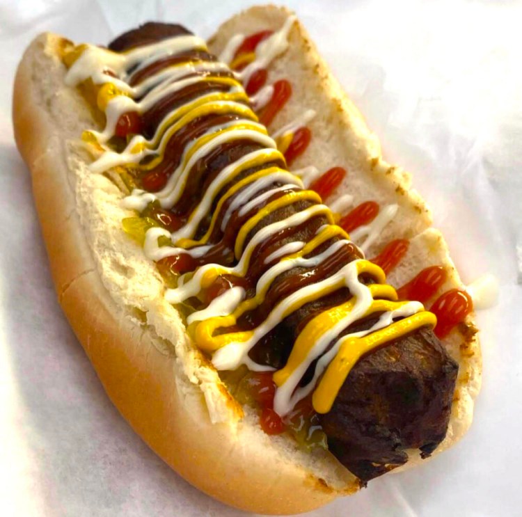 The vegan hot dogs at The Moody Dog food cart and food truck in Belfast are made in house, from an allergen-friendly recipe based on bean flour and pureed vegetables. Vegan dogs are becoming more popular across the country, but we Mainers have been able to enjoy them for years. 
