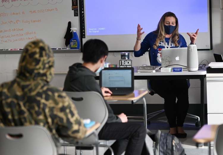 As part of a statewide effort to boost vaccinations in schools, state health officials have collected and posted data on student vaccination rates in Maine schools. Biddeford High English teacher Heather Tremblay teaches a class last winter.