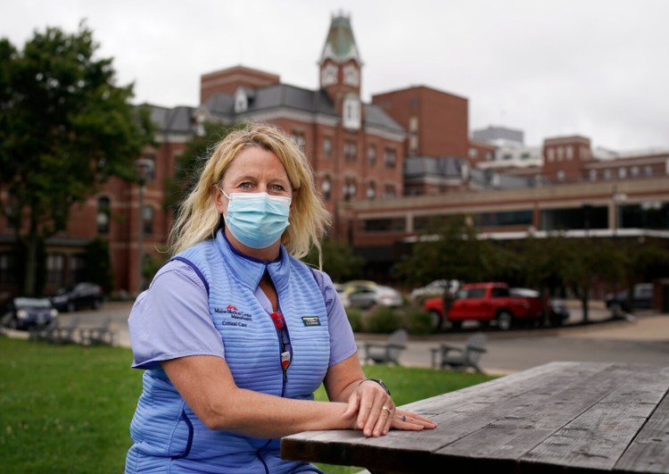 Shannon Calvert, an intensive care nurse at Maine Medical Center, believes the current spike in cases could be flattened if more people got vaccinated.