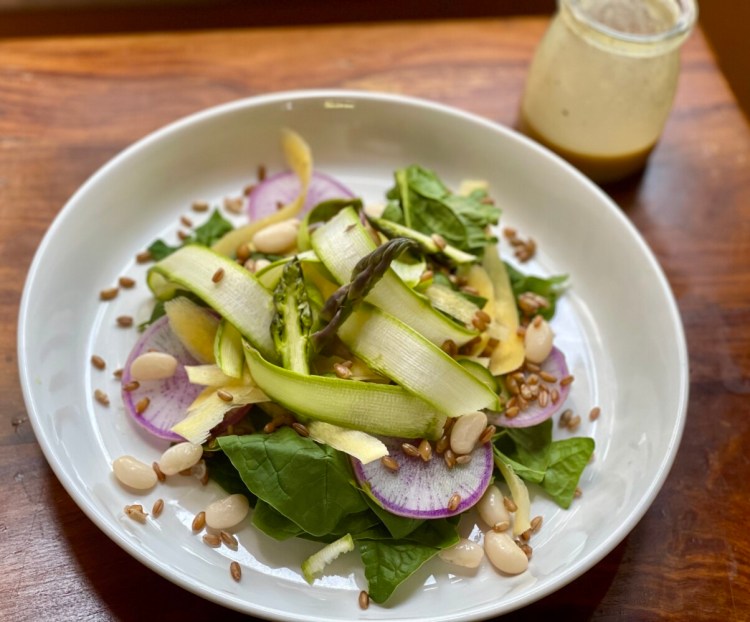 Shaved asparagus spring veggie salad. Shaving asparagus is one way to stretch the vegetable, which sells for as much as $12 a pound at local farmers markets. 