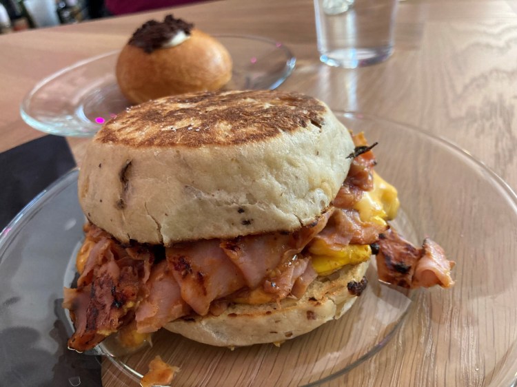 The Yinz Breakfast Sandwich and, in back, a trocadero.